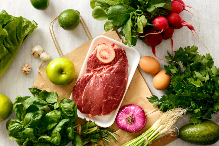 Elimination diet foods including grass-fed beef and fresh vegetables