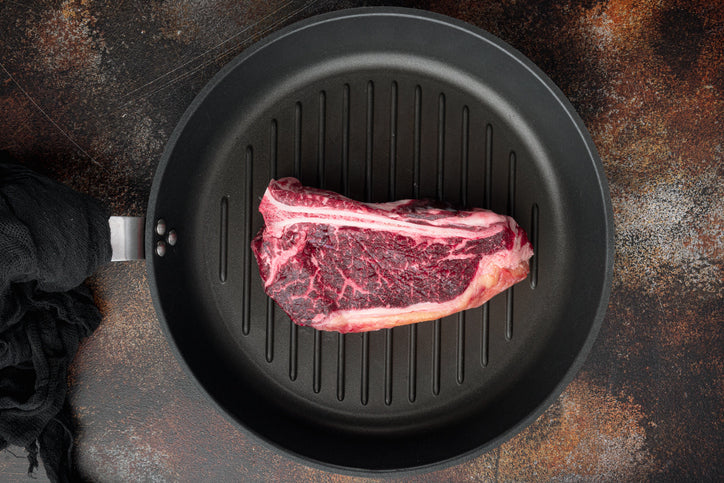 Grass-Fed Bone-In Kansas City Strip Steak from Texas Grass Fed Farms - bone-in strip steak - AGA Certified 100% grass-fed beef